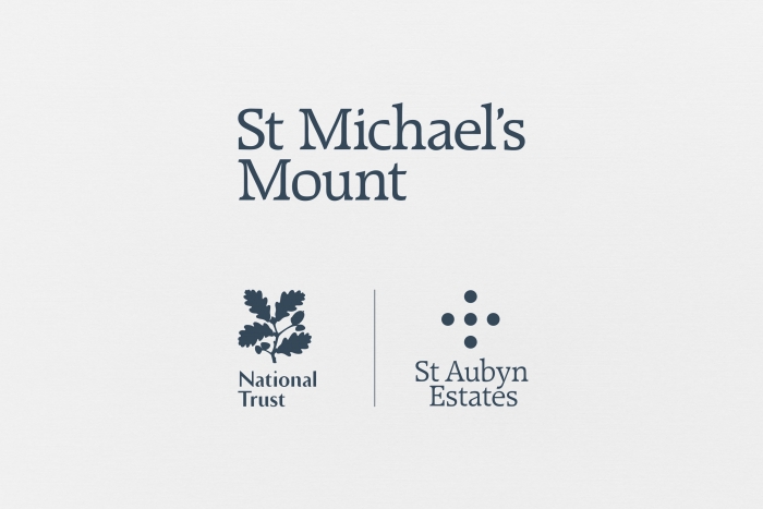 The St Michael's Mount logo above the National Trust and St Aubyn Estates logos.