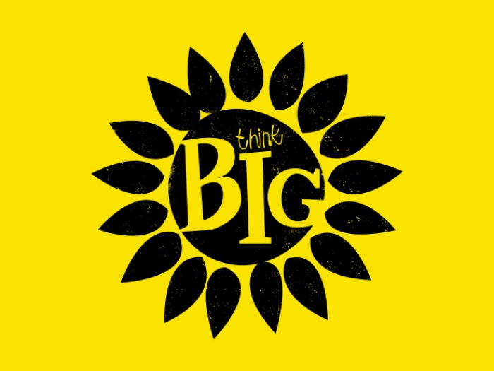A sunflower icon with 'Think big' typed inside it.