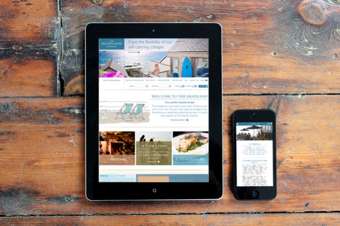 An iPad and an iPhone with the Headland Hotel website loaded.