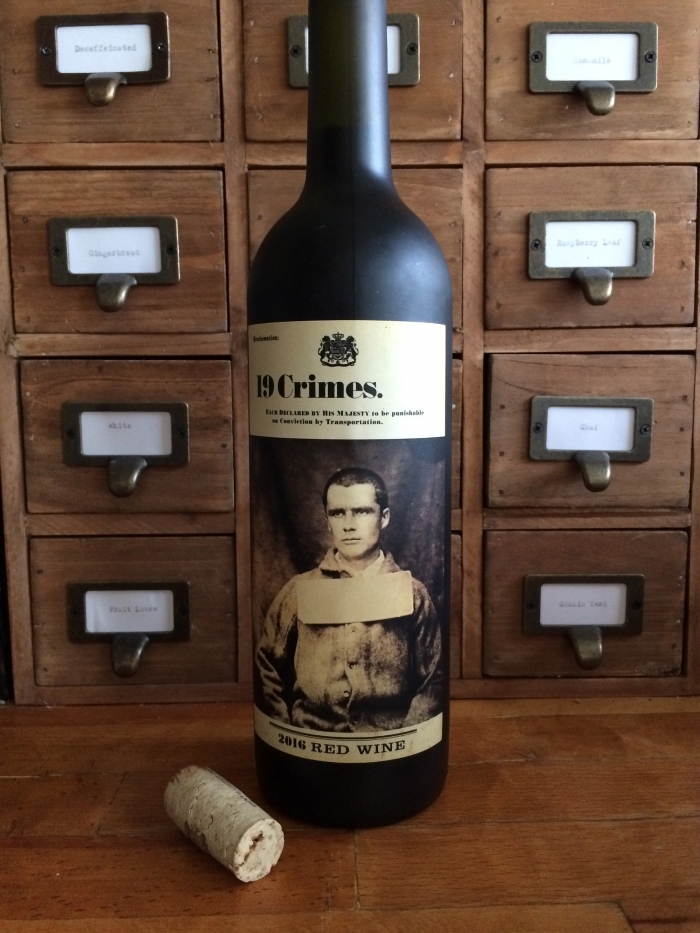 A bottle of 19 Crimes wine, which has an AR vintage photo of a convict on the label.