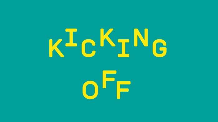'Kicking off' in an alternating down-up typeface.